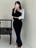 ⁦كنزة صوفية بتصميم غير متماثل⁩ - الصورة ⁦5⁩