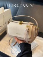 حقيبة نسائية انيقة بألوان موحدة