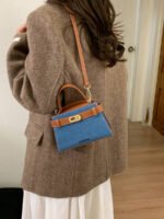 ⁦حقيبة يد صغيرة بتصميم حزام⁩ - الصورة ⁦35⁩